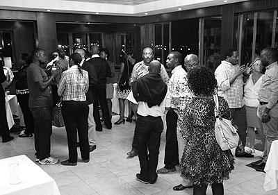 Guests chat during the Thursday event. The hotel has promised top class services. The New Times / Timothy Kisambira.