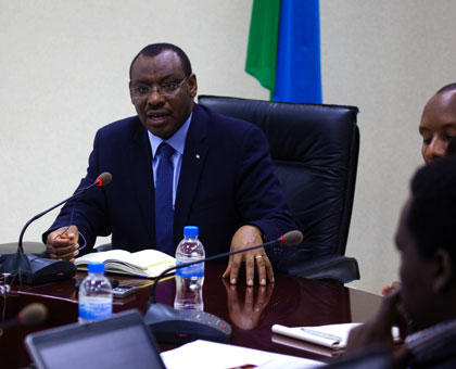 Finance minister Claver Gatete addresses  the press in the ministryu2019s boardroom yesterday. T.Kisambira.