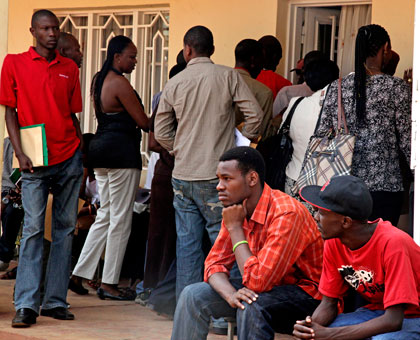 People await notary service in Kicukiro District. Gasabo has been without a notary for several months. Timothy Kisambira.