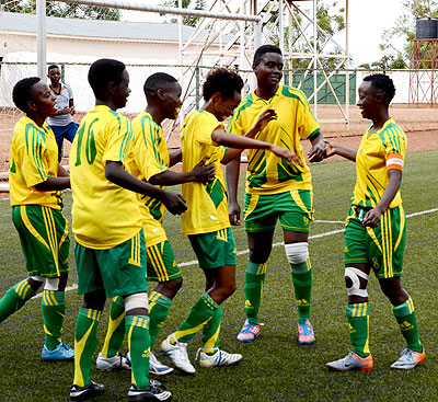 AS Kigali skipper Shadia Uwamahirwe, right, celebrates with her team mates after scoring in a previous league match. S. Ngendahimana