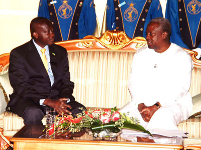 Rwandau2019s High Commissioner to Ghana, Joseph Habineza, and Ghanaian President John Dramani Mahama at the Flagstaff House, the Presidential Palace, in the capital Accra. (Courtesy)