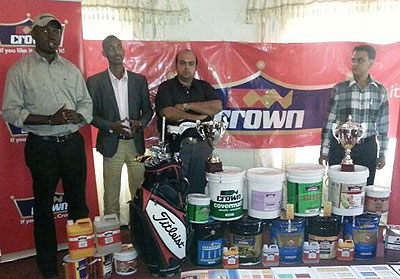 Kigali Golf Club captain Anthony Olwit, left, addresses a press conference alongside Crown Paints Rwanda Country Manager Vipul Kapul, center.  Courtesy