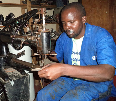 Twizeyimana at  work in one of his workshops. The investor started with Rwf60,000 but today his investment is worth millions.