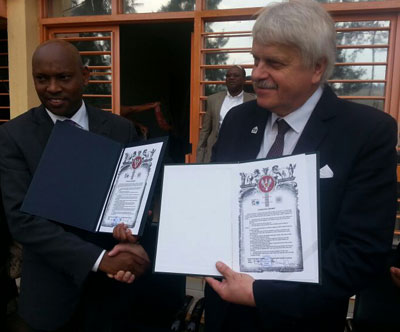 Namara and Gerliz display the deal documents. The agreement is tipped to ease relations between Rwandan businesspeople and their Polish counterparts and spur bilateral trade. The New Times / Peterson Tumwebaze.