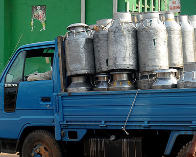 A dealer transports milk. A new organisation has taken over the supervisory role of the dairy sector. The New Times. File.