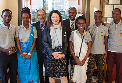 The Governor General, Sir Jerry Mateparae (background left) and Dr Murigande  (background right) with the Honorary Consul (front row centre) and members of the Rwandan Community during the commemoration activity. Courtesy.