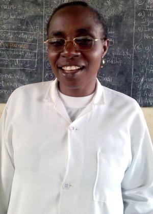 Mukankaka jokes with her pupils in class. ELIZABETH BUHUNGIRO 