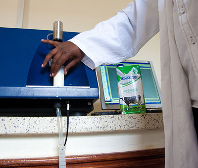 A labaratory technician at Rwanda Bureau of Standards testing milk.Timothy Kisambira.