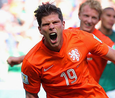 Huntelaar wheels away to celebrate after his last-gasp winner. Net