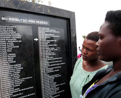 Survivors view the names of their relatives who were killed in the  of Genocide.  File.