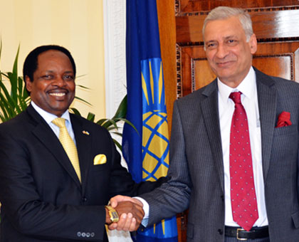 Commonwealth Secretary-General Kamalesh Sharma (right) receives Amb. Nkurunziza at Marlborough House, the headquarters of the organisation, in London yesterday. Courtesy.