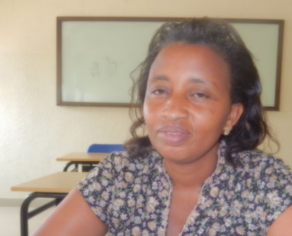 Besides teaching, Tumwine also helps resolve disputes in her Nyarugenge community. (Solomon Asaba)