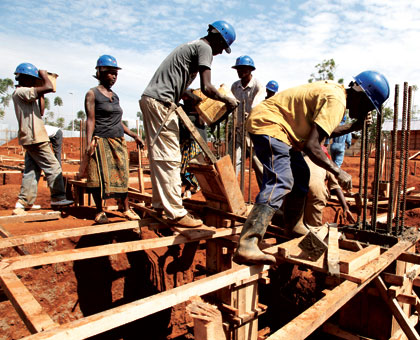 Builders at a construction site. The city sector instituted reforms in the construction industry last year that have greatly eased processes.