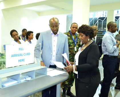 Health Minister Agnes Binagwaho (R) together with Infrastructure Minister James Musoni at Kigali International Airport. (Courtesy)