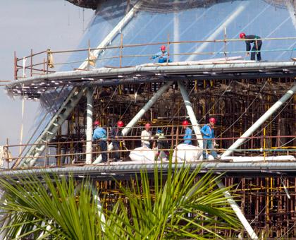 Chinese construction workers at the new Kigali Convention Center. (Timothy Kisambira)