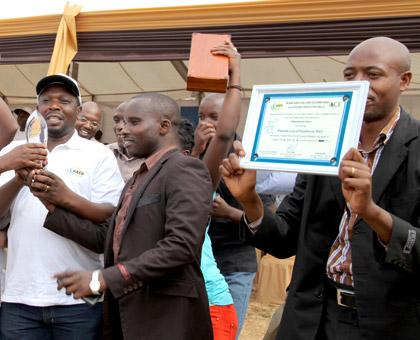 Muhondo Coffee farmers celebrate after winning this yearu2019s Rwanda cup of Excellency yesterday. (John Mbanda)