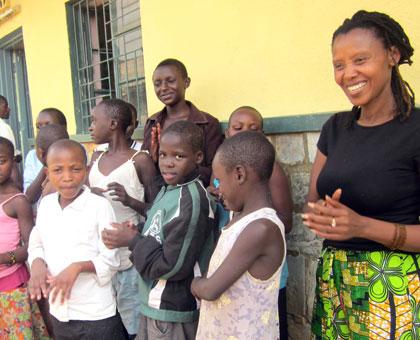 Nicolette Nsabimana with some of the girls under her care. (Eugene Kwibuka)