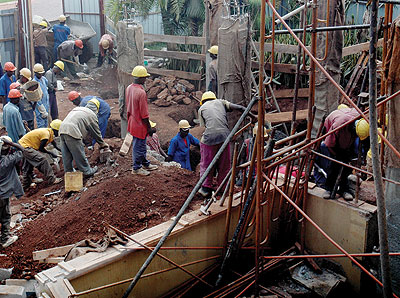 Workers at a construction site. Construction sector players say the lack of a clear policy to regulate the operations is exposing the sector to risks that could be costly to the economy. (File)