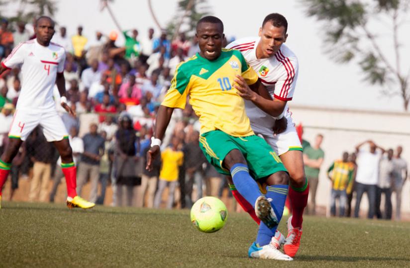 Michel Ndahinduka (with the ball) will lead Rwanda strikcking force in 2016 Chan. (Timothy Kisambira)