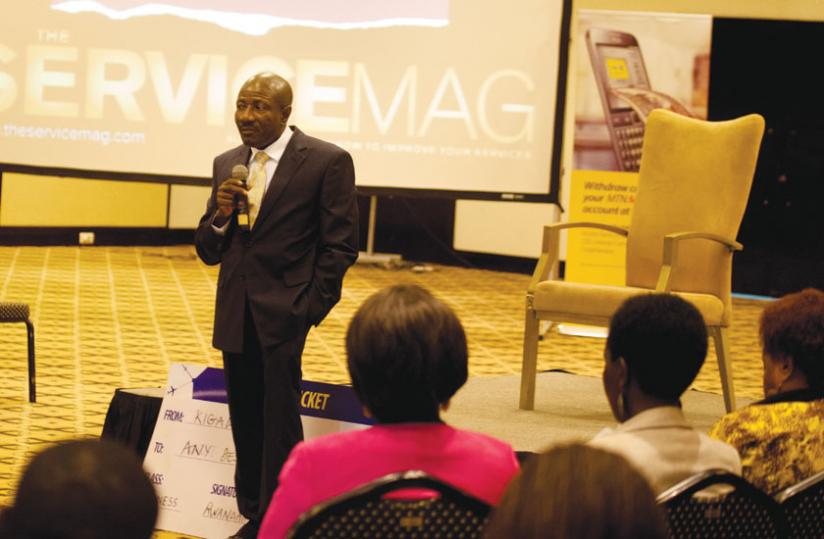 MTN Rwanda boss Ebenezer Asante speaks at the event at the Kigali Serana Hotel. (Timothy Kisambira)