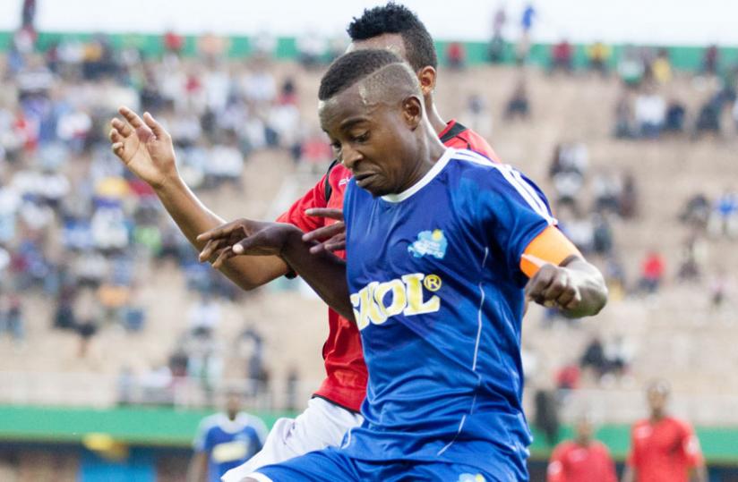 Rayon Sport Captain Fuad Ndayisenga tries to get past an opponent in the Peace Cup. Some Rayon fans are anxious over the delay to bring in an experienced coach. (File)