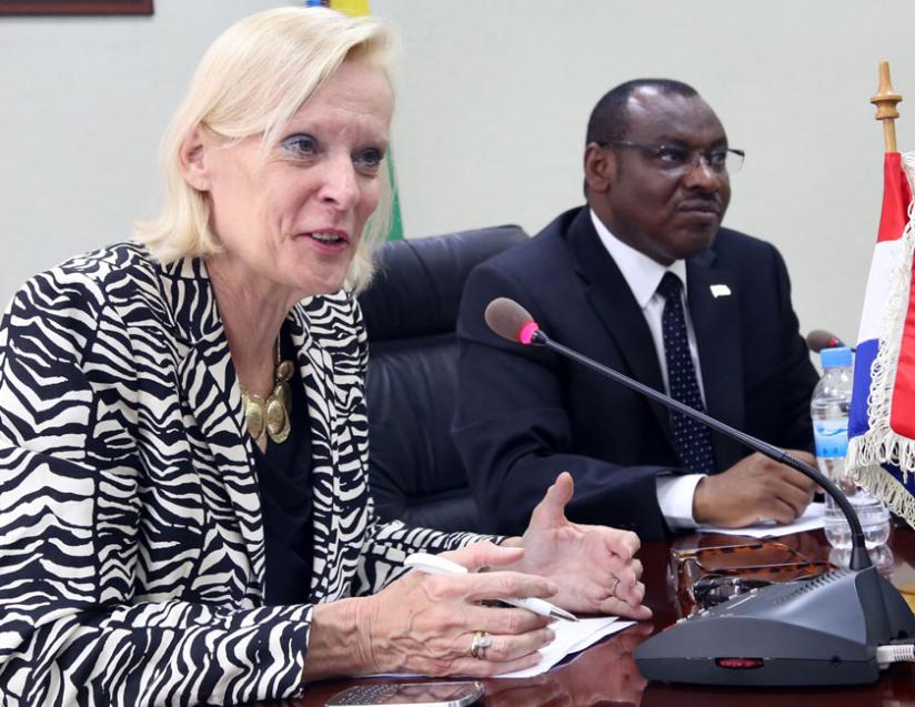 Amb. Cuelenaere (left) and Claver Gatete address the press after the signing ceremony yesterday.(John Mbanda)