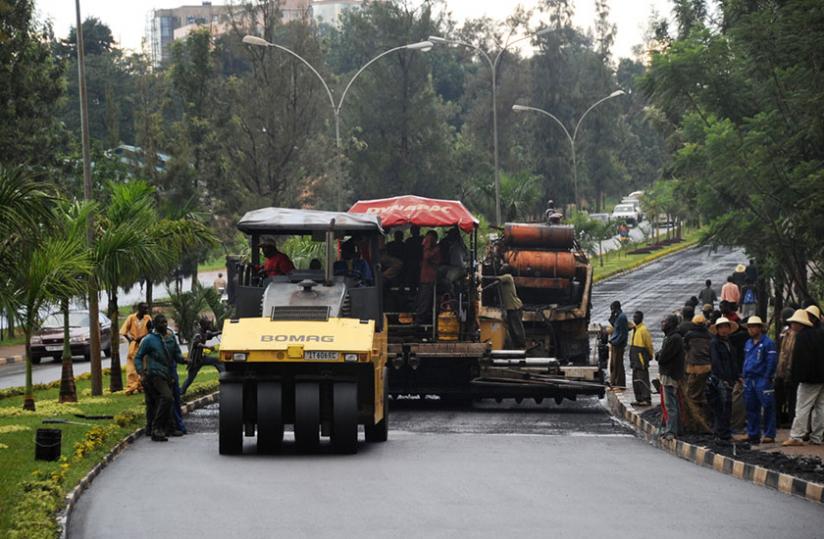 Contractors work on Kigali International Airport road in 2011. Senators have decried the flaws in public procurement process. (File)