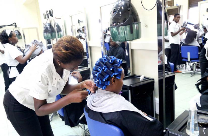 A hair dressing school in Kigali. Business development advisors will assist potential entrepreneurs in preparing business plans that are then pre-screened by BRD before submission to banks. (John Mbanda)