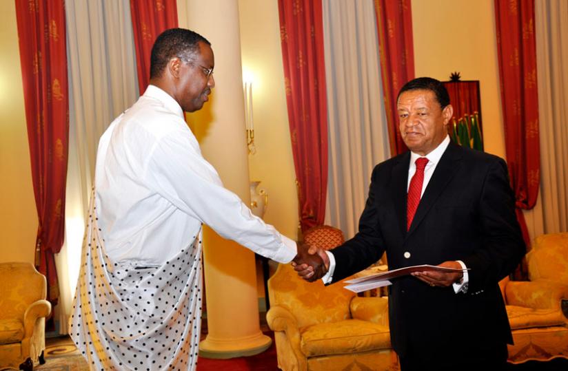 Mitali (L) presents his credentials to President Teshome. (Courtesy)