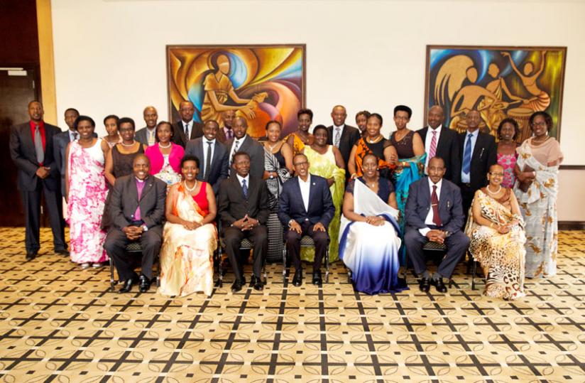 President Kagame (C) and First Lady Jeannette Kagame (to his left) together with the church leaders and other government officials in a group photo after the Prayer Breakfast in Kigali yesterday. (Village Urugwiro)