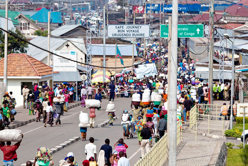 A busy Goma border post between Rwanda and DR Congo. Kinshasa has requested Kigali to host CEPGL summit this year.  (Timothy Kisambira)