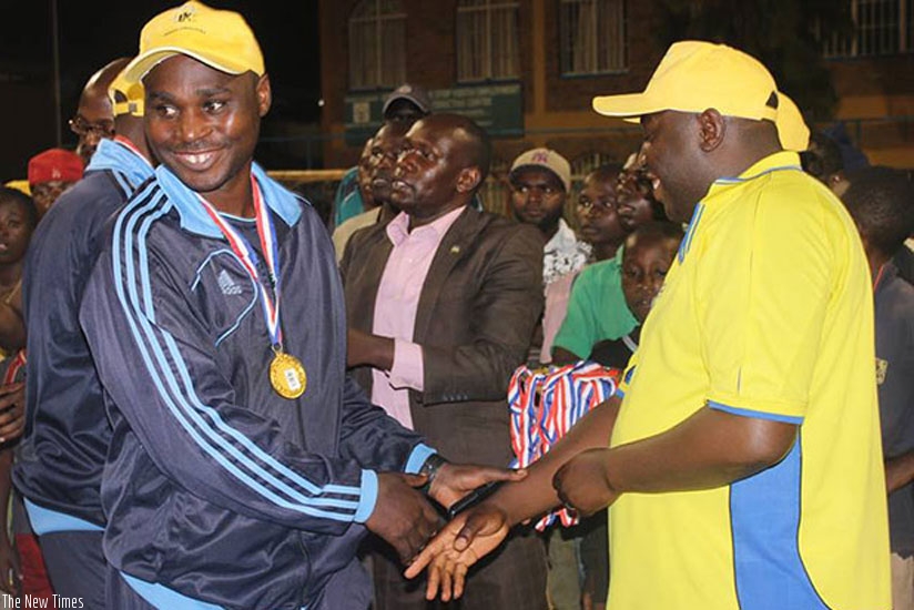 National Handball team coach Antoine Ntabanganyimana (L) wants friendlies to sharpen his team's preps for the Zone V Handball tournament. rn(Net photo)