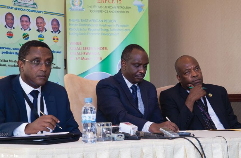 Natural Resource minister Vincent Biruta (left), EAC Secretary General Richard Sezibera (centre) and Dr Harrison George Makyembe, the chairperson of EAC Council of Ministers at the conference on Wednesday. (Timothy Kisambira)