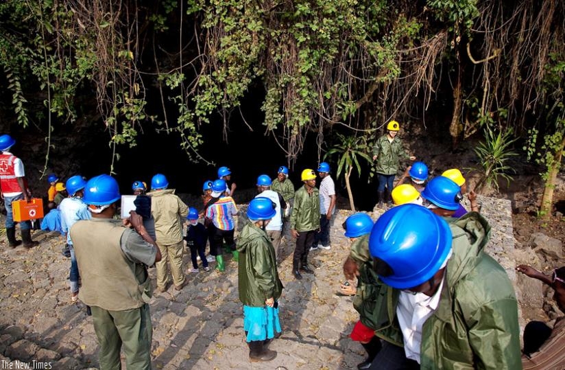 Tourists being briefed before embarking on a tour of the Musanze Cave. (File)