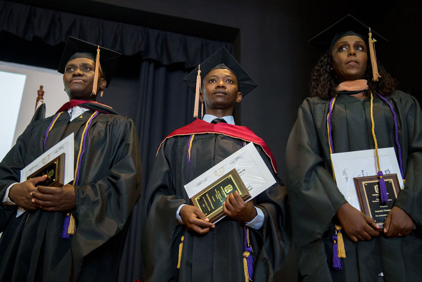 Some of the outstanding graduates after the Delta Mu Delta ceremony that recognises and rewards superior scholastic achievements of students in Business Administration. (All photos by Timothy Kisambira)