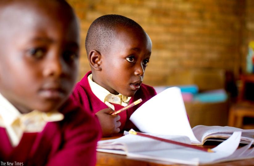 A pupil follows lessons attentively in Rusheshe school in Kicukiro District. (T. Kisambira)