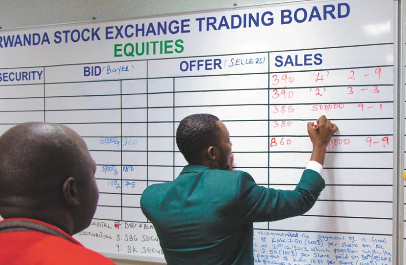 An RSE staff records deals during a recent trading session. The local bourse has performed poorly over the past week.  (Ben Gasore)