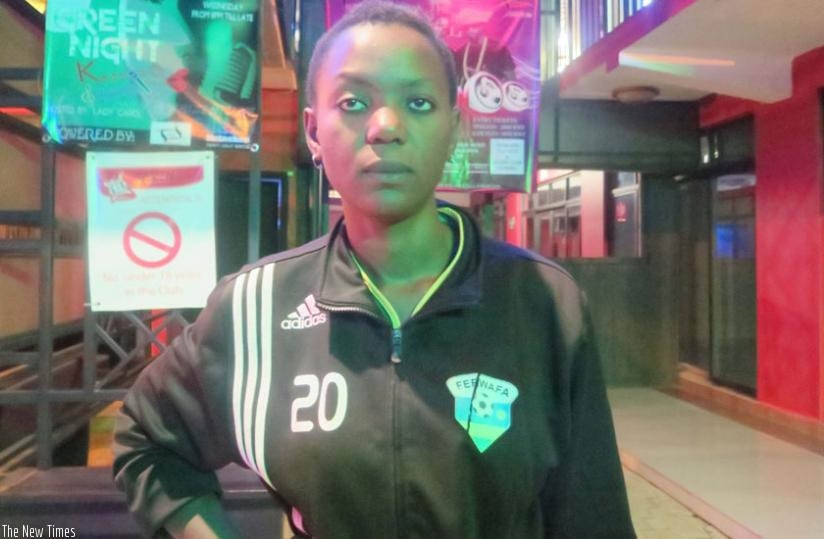 Kaizen's female bouncer, Shamilla Nyinawumuntu, outside the club. (M.Ingabire)