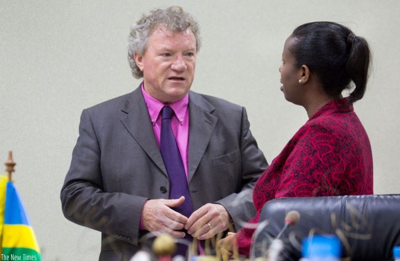 Amb. Ryan chats with Minister Kamayirese before the signing ceremony in Kigali yesterday. (Timothy Kisambira)