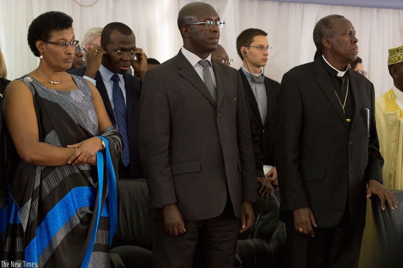 L-R: Speaker of Parliament Donatile Mukabalisa, Prime Minister Anastase Murekezi and Mgr. Smaragde Mbonyintege follow proceedings at Kigali Memorial Centre yesterday.  