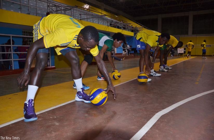 National Volleyball team players during training at Amahoro stadium. Each player will walk away with Rwf700,000 if they win the Zone V championship. (File)