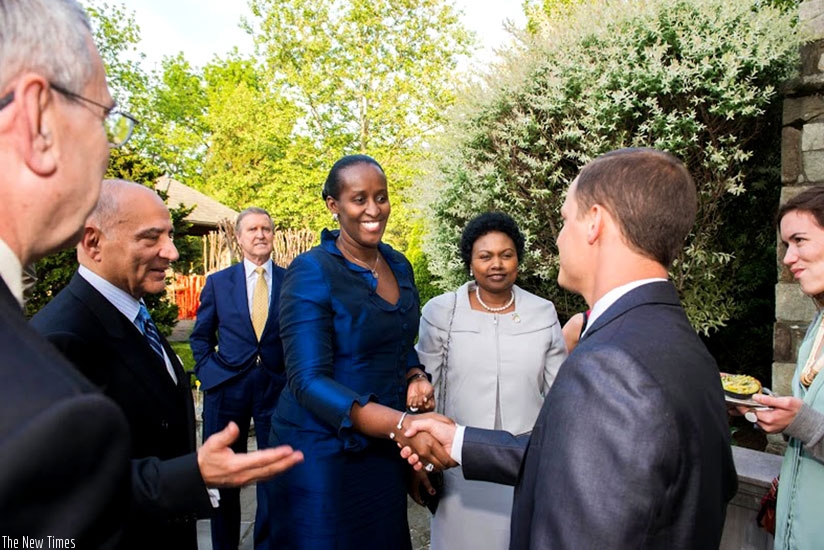 First Lady Jeannette Kagame is introduced to guests by Ansari (2nd L) as she arrives for the fundraiser. (Courtesy)