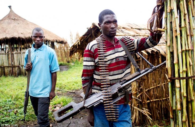 FDLR militiamen at their camp in Buleusa in eastern DR Congo. (Net photo)