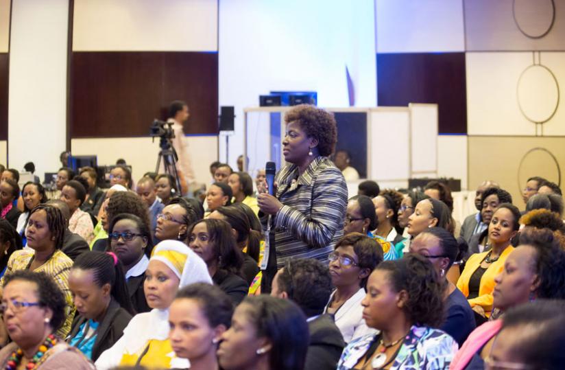 A participant poses a question during the conference. (Timothy Kisambira)