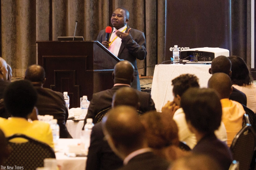 Baliraine speaks at the breakfast meeting yesterday. Experts says tax exemptions in the new budget will help spur grow. (Timothy Kisimbira)
