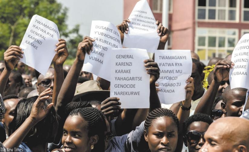 Hundreds of protesters outside the UK High Commission offices in Kigali, yesterday, demanding the release of Gen Karenzi Karake. (Doreen Umutesi)