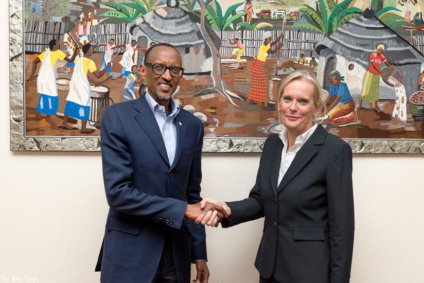 Outgoing Dutch Ambassador to Rwanda Leoni Cuelenaere bids farewell to President Kagame at Village Urugwiro in Kigali yesterday.rn(Village Urugwiro)