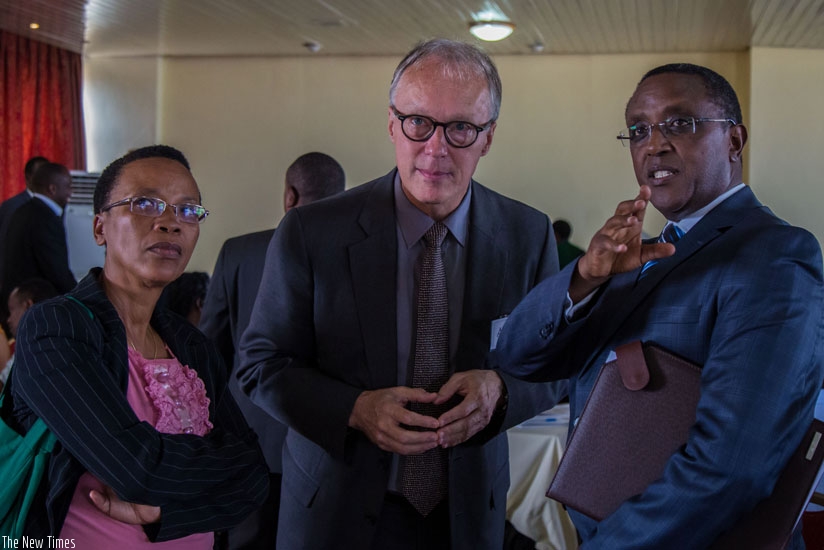 L-R: Dr Rose Mukankomeje, the Director General of Rema, Ari Huhtala, the deputy CEO of Policy and Programmes Overseas Development Institute in UK, and Dr Vincent Biruta, the Natural Resources Minister, at the ongoing three-day workshop on climate change in Kigali yesterday. (All photos by Timothy Kisambira)