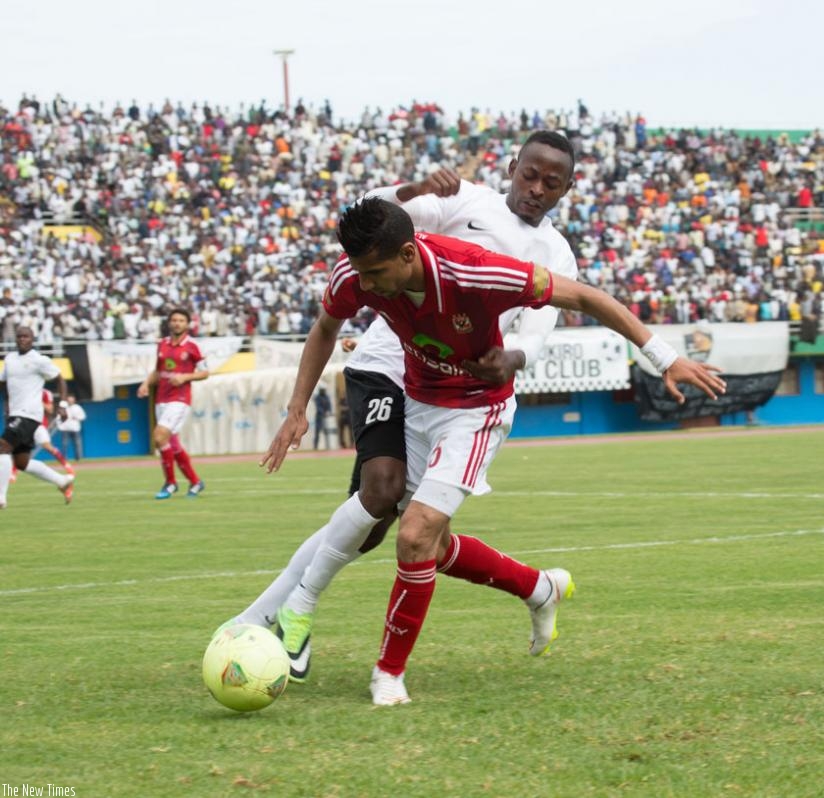 APR striker Issa Bigirimana (L) during a CAF Champions League game against Al Ahly in April, scored the winner in yesterday's 2-1 victory over Lydia Ludic of Burundi. (Timothy Kisambira)