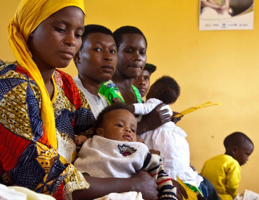 Mothers waiting for service at Busanza Health centre in Kanombe. Most working mothers have tight working schedules, but the trend ought to be revised to enable them breastfeed. (File)